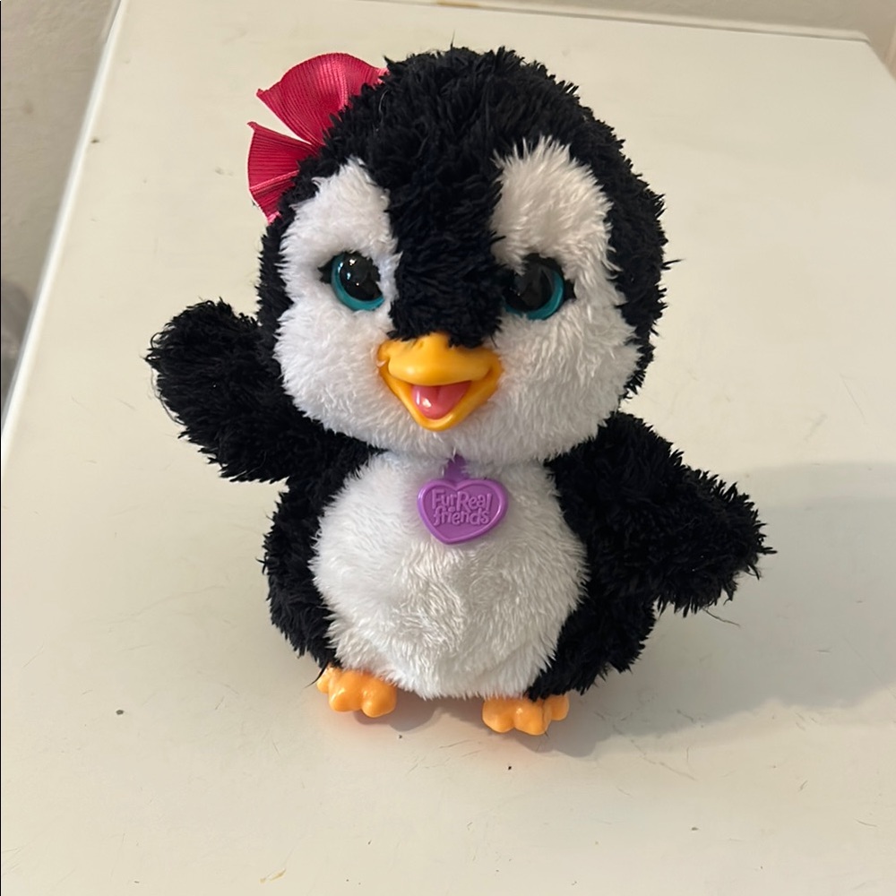 Fur Real Penguin Piper 7”. She works great and is so animated. Gently used.